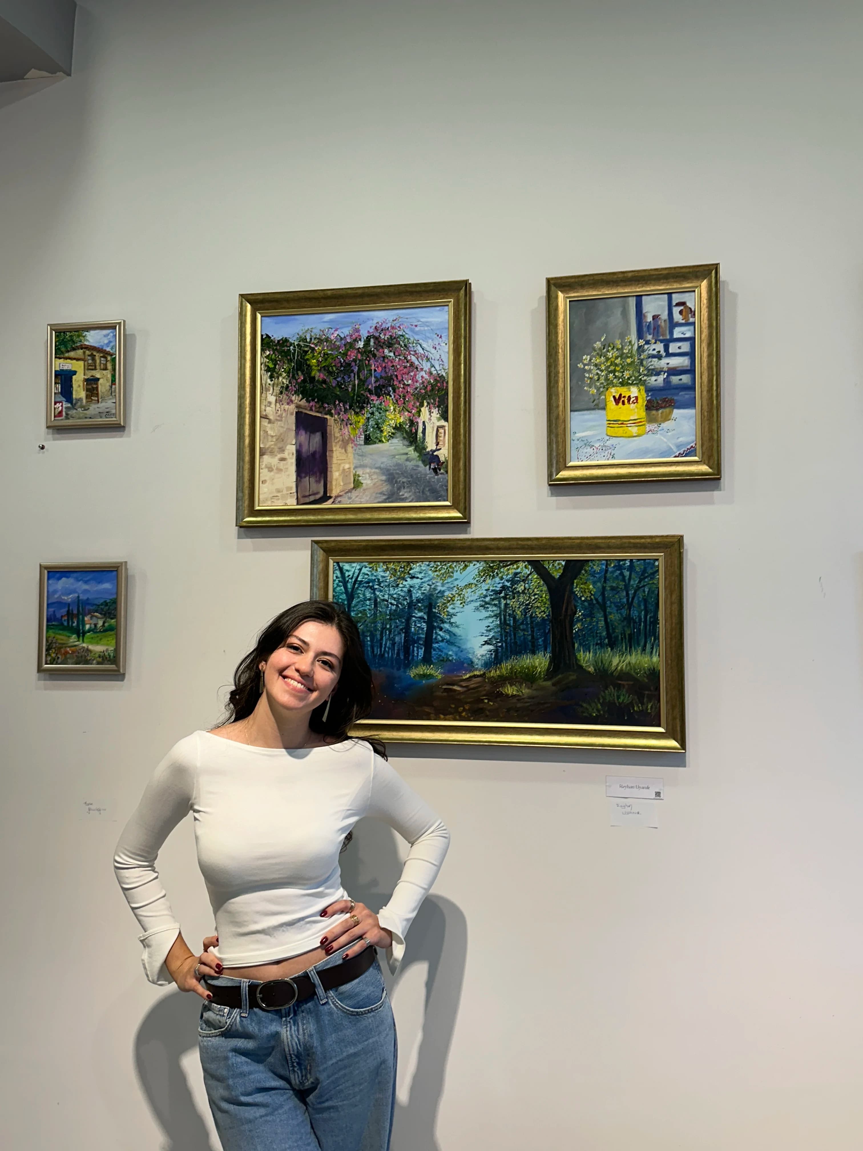 Artist Reyhan Uyanik with her work